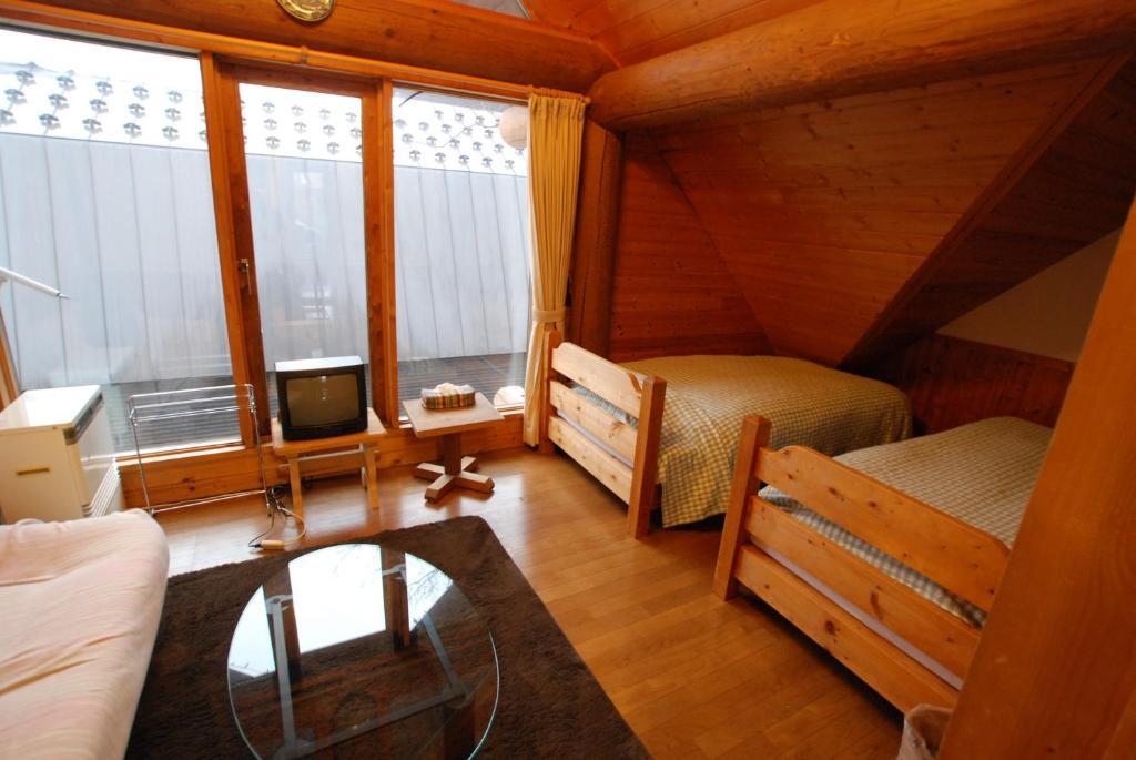 Pension Woody Note Niseko Rom bilde